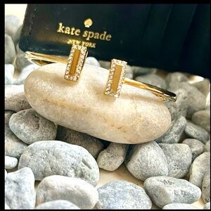 Kate Spade “RaiseThe Bar” cuff bracelet.